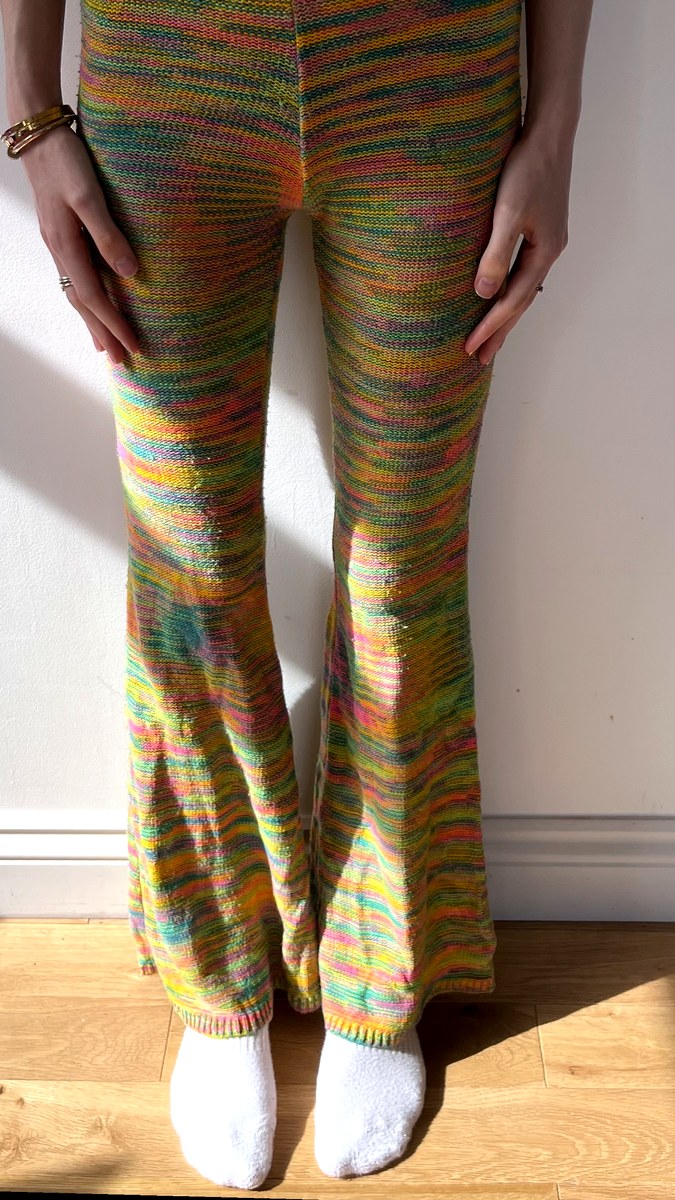 Green and orange colourful knit flared trousers