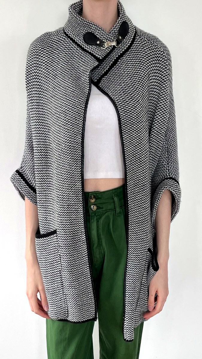 Black and white Paris style woven jacket cape with brooch detail